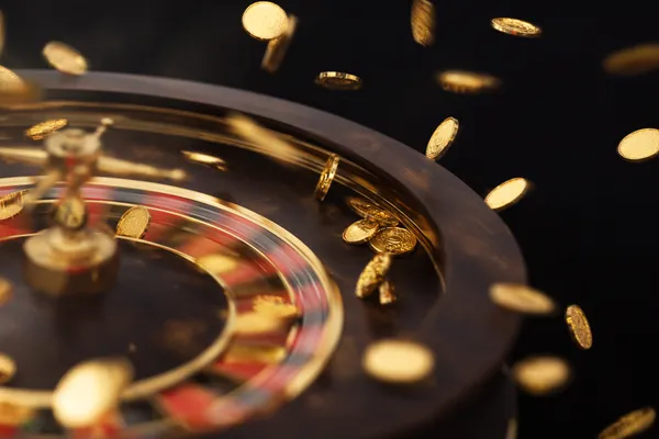 A dramatic shot of winning sevens landing on a slot reel surrounded by shining gold coins, symbolizing big wins.
